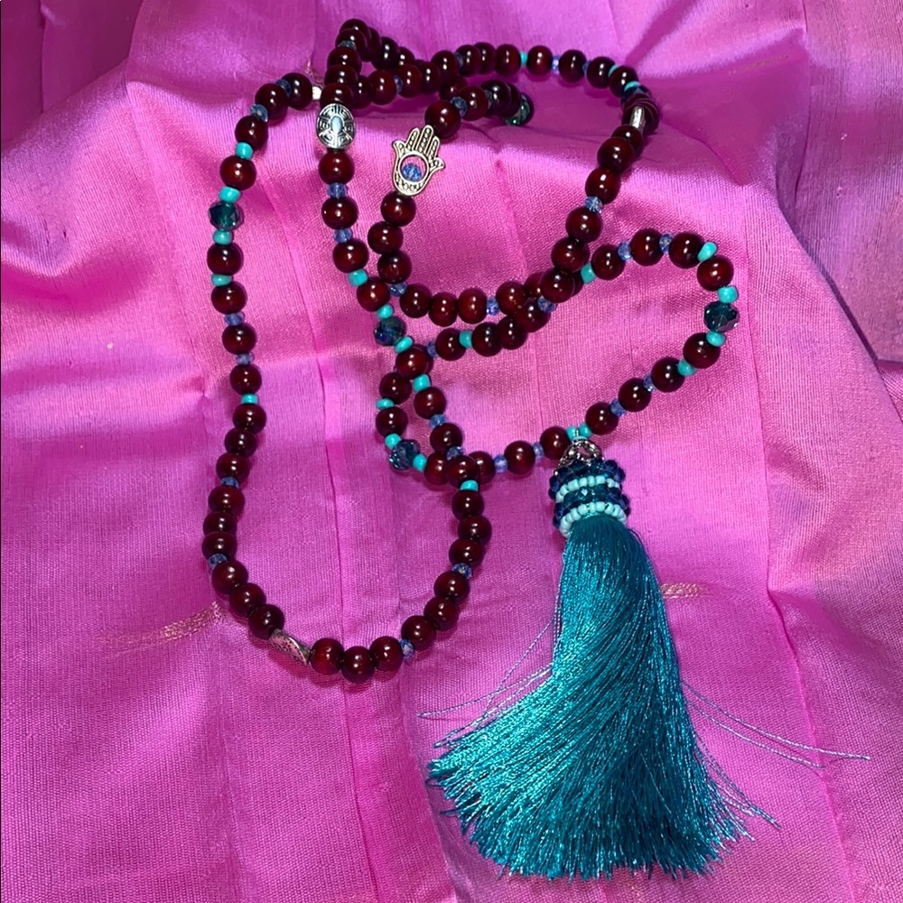 Elegant Beaded Necklace with Teal Tassel